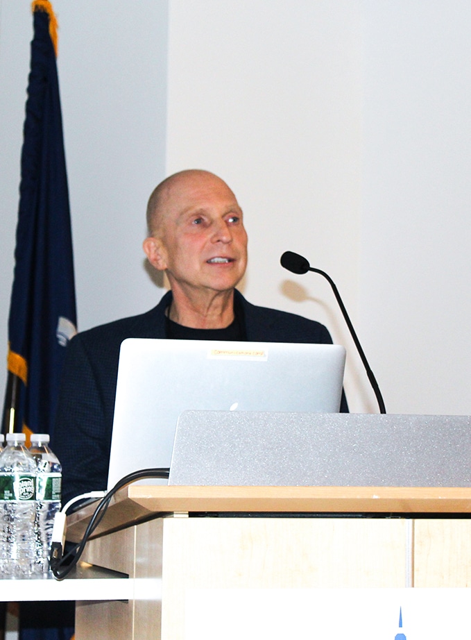 An NYGC partner delivers a speech